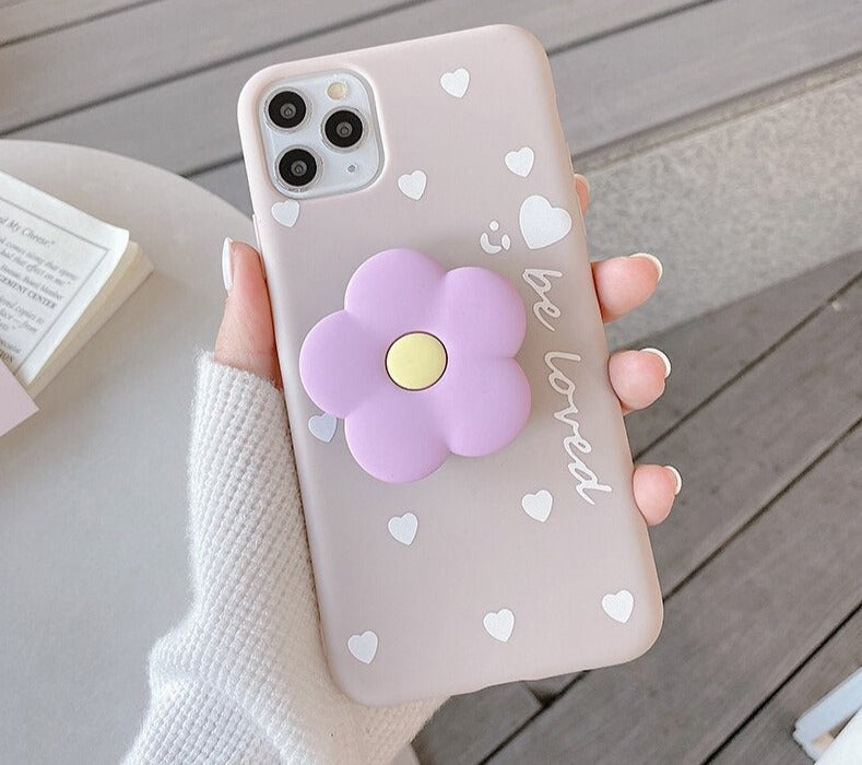 Lovely flower holder stand Soft phone casesM&H FashioniPhoneM&H FashionIntroducing the Lovely Flower Holder Stand Soft Phone Cases for iPhone. This stylish phone case is perfect for adding a touch of elegance to your device. It featuresLovely flower holder stand Soft phone cases