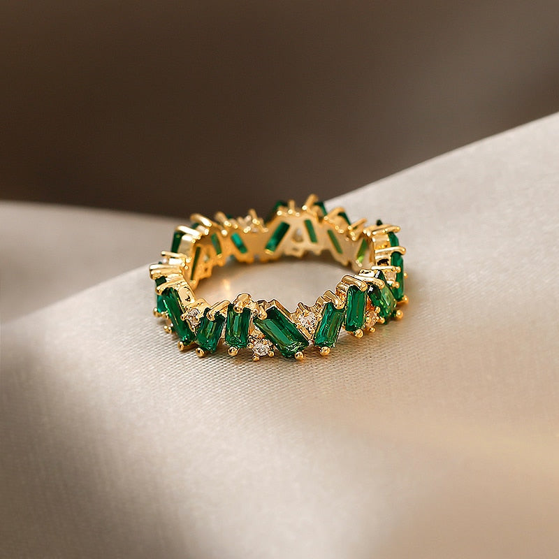 Luxury Green Crystal RingsM&H FashionM&H FashionIntroducing the Luxury Green Crystal Rings from MH.net.co. These classic rings feature a geometric shape and a pave setting. Crafted from brass and semi-precious stoLuxury Green Crystal Rings