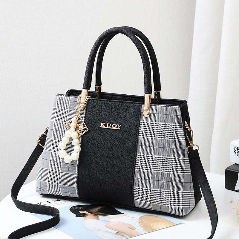Hanging Leather HandbagM&H FashionHandbagsM&H FashionIntroducing the Hanging Leather Handbag, the perfect accessory for any fashionista. This stylish bag is made from PU material and features a patchwork design. It hasHanging Leather Handbag