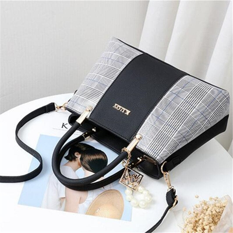 Hanging Leather HandbagM&H FashionHandbagsM&H FashionIntroducing the Hanging Leather Handbag, the perfect accessory for any fashionista. This stylish bag is made from PU material and features a patchwork design. It hasHanging Leather Handbag