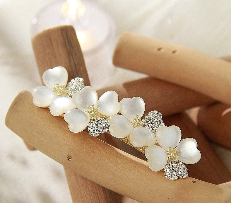 Luxury White Opal Flower Spring Hairpin SetM&H FashionM&H FashionIntroducing the New Luxury White Opal Flower Spring Hairpin Set. This set of hairpins is the perfect accessory for any woman's wardrobe. Crafted from iron alloy and New Luxury White Opal Flower Spring Hairpin Set