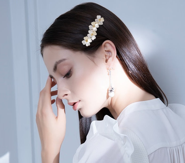 Luxury White Opal Flower Spring Hairpin SetM&H FashionM&H FashionIntroducing the New Luxury White Opal Flower Spring Hairpin Set. This set of hairpins is the perfect accessory for any woman's wardrobe. Crafted from iron alloy and New Luxury White Opal Flower Spring Hairpin Set