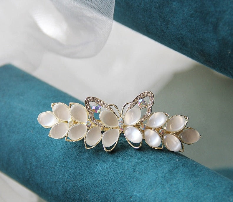 Luxury White Opal Flower Spring Hairpin SetM&H FashionM&H FashionIntroducing the New Luxury White Opal Flower Spring Hairpin Set. This set of hairpins is the perfect accessory for any woman's wardrobe. Crafted from iron alloy and New Luxury White Opal Flower Spring Hairpin Set