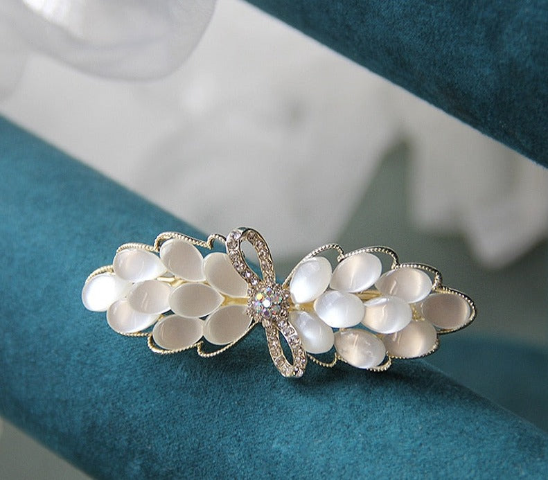 Luxury White Opal Flower Spring Hairpin SetM&H FashionM&H FashionIntroducing the New Luxury White Opal Flower Spring Hairpin Set. This set of hairpins is the perfect accessory for any woman's wardrobe. Crafted from iron alloy and New Luxury White Opal Flower Spring Hairpin Set