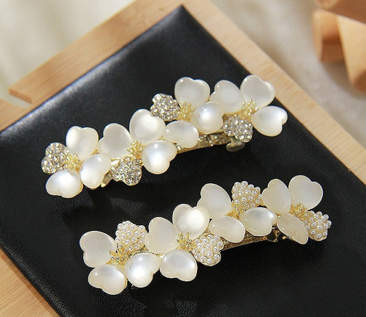 Luxury White Opal Flower Spring Hairpin SetM&H FashionM&H FashionIntroducing the New Luxury White Opal Flower Spring Hairpin Set. This set of hairpins is the perfect accessory for any woman's wardrobe. Crafted from iron alloy and New Luxury White Opal Flower Spring Hairpin Set