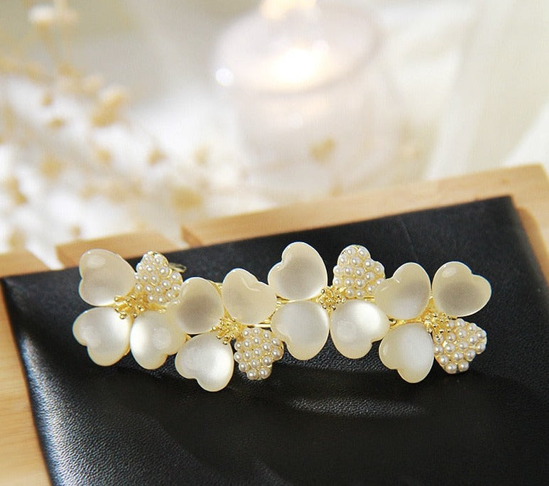 Luxury White Opal Flower Spring Hairpin SetM&H FashionM&H FashionIntroducing the New Luxury White Opal Flower Spring Hairpin Set. This set of hairpins is the perfect accessory for any woman's wardrobe. Crafted from iron alloy and New Luxury White Opal Flower Spring Hairpin Set