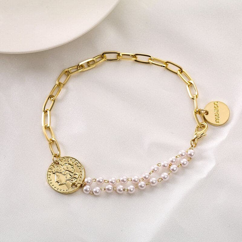 Gold Colour Flower Charm BraceletM&H FashionM&H FashionThis Gold Colour Flower Charm Bracelet is the perfect accessory for any occasion. Crafted from zinc alloy and metal, this bracelet is sure to make a statement. The tGold Colour Flower Charm Bracelet