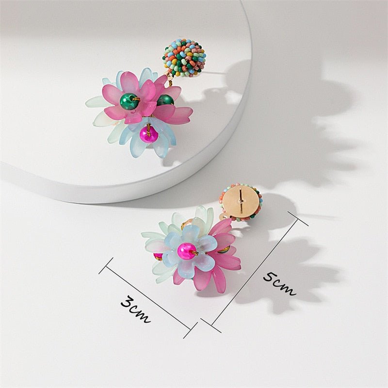 Colourful Flowers Earrings - M&H FashionColourful Flowers EarringsM&H FashionM&H Fashion200001034:367#1Colourful Flowers EarringsM&H FashionM&H FashionThese Colourful Flowers Earrings are the perfect accessory for any outfit. With a classic style and irregular shape, these earrings are sure to make a statement. CraColourful Flowers Earrings