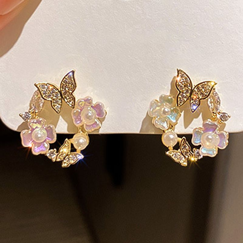 Flower & Butterfly Earrings - M&H FashionFlower & Butterfly EarringsM&H FashionM&H Fashion200001034:200003758#66Flower & Butterfly EarringsM&H FashionM&H FashionThese Flower &amp; Butterfly Earrings are the perfect accessory for any outfit. With a trendy style and geometric shape, these earrings are sure to make a statement.Flower & Butterfly Earrings