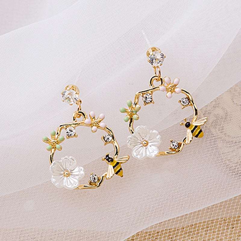 Flower & Butterfly Earrings - M&H FashionFlower & Butterfly EarringsM&H FashionM&H Fashion200001034:200003762#1010Flower & Butterfly EarringsM&H FashionM&H FashionThese Flower &amp; Butterfly Earrings are the perfect accessory for any outfit. With a trendy style and geometric shape, these earrings are sure to make a statement.Flower & Butterfly Earrings