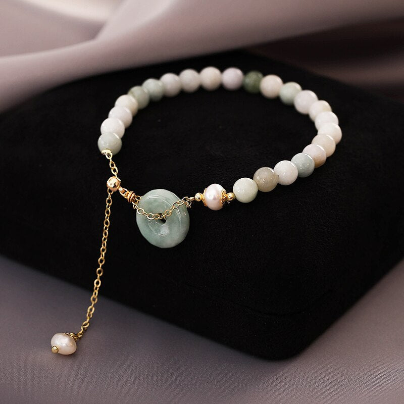 Light Blue Natural Stone Pearl Bracelet - M&H FashionLight Blue Natural Stone Pearl BraceletM&H FashionM&H Fashion200001034:361181;200000783:200013901Light Blue Natural Stone Pearl BraceletM&H FashionM&H FashionThis Light Blue Natural Stone Pearl Bracelet is a classic piece of jewelry that will never go out of style. Crafted from copper alloy and natural stone, this braceleLight Blue Natural Stone Pearl Bracelet