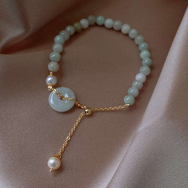 Light Blue Natural Stone Pearl Bracelet - M&H FashionLight Blue Natural Stone Pearl BraceletM&H FashionM&H Fashion200001034:361181;200000783:200013901Light Blue Natural Stone Pearl BraceletM&H FashionM&H FashionThis Light Blue Natural Stone Pearl Bracelet is a classic piece of jewelry that will never go out of style. Crafted from copper alloy and natural stone, this braceleLight Blue Natural Stone Pearl Bracelet