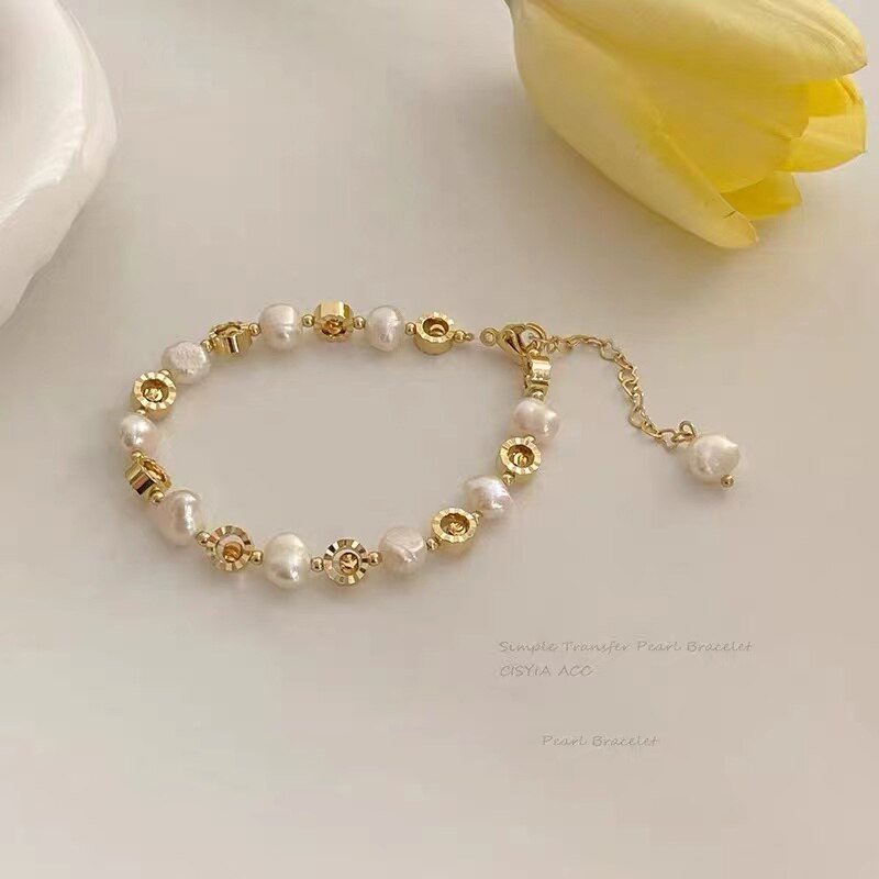 Luxury Natural Pearl Bracelet - M&H FashionLuxury Natural Pearl BraceletM&H FashionM&H Fashion200001034:361181;200000639:2832Luxury Natural Pearl BraceletM&H FashionM&H FashionThis Luxury Natural Pearl Bracelet is a timeless classic. Crafted with freshwater pearls and set in a pave setting, this bracelet is sure to make a statement. The coLuxury Natural Pearl Bracelet