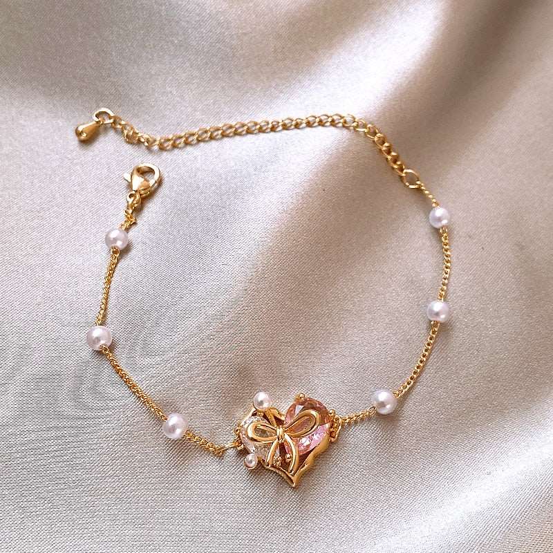 Luxury Pink Zircon Heart Pearl Gold Bracelet - M&H FashionLuxury Pink Zircon Heart Pearl Gold BraceletM&H FashionM&H Fashion200001034:361181Luxury Pink Zircon Heart Pearl Gold BraceletM&H FashionM&H FashionThis Luxury Pink Zircon Heart Pearl Gold Bracelet is a classic piece of jewelry. It features a pave setting with copper and cubic zirconia. The bracelet is sure to mLuxury Pink Zircon Heart Pearl Gold Bracelet