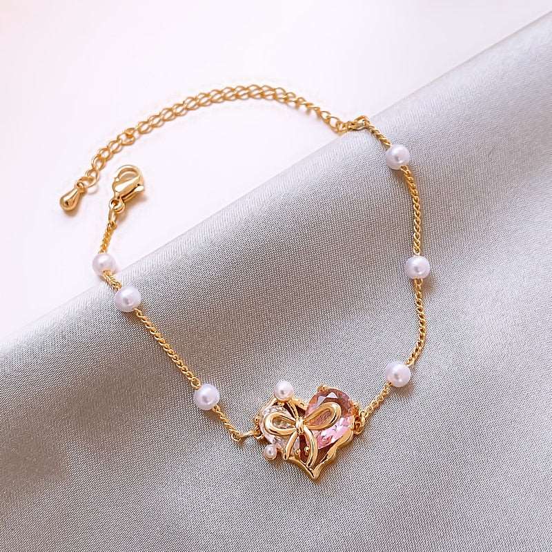 Luxury Pink Zircon Heart Pearl Gold Bracelet - M&H FashionLuxury Pink Zircon Heart Pearl Gold BraceletM&H FashionM&H Fashion200001034:361181Luxury Pink Zircon Heart Pearl Gold BraceletM&H FashionM&H FashionThis Luxury Pink Zircon Heart Pearl Gold Bracelet is a classic piece of jewelry. It features a pave setting with copper and cubic zirconia. The bracelet is sure to mLuxury Pink Zircon Heart Pearl Gold Bracelet