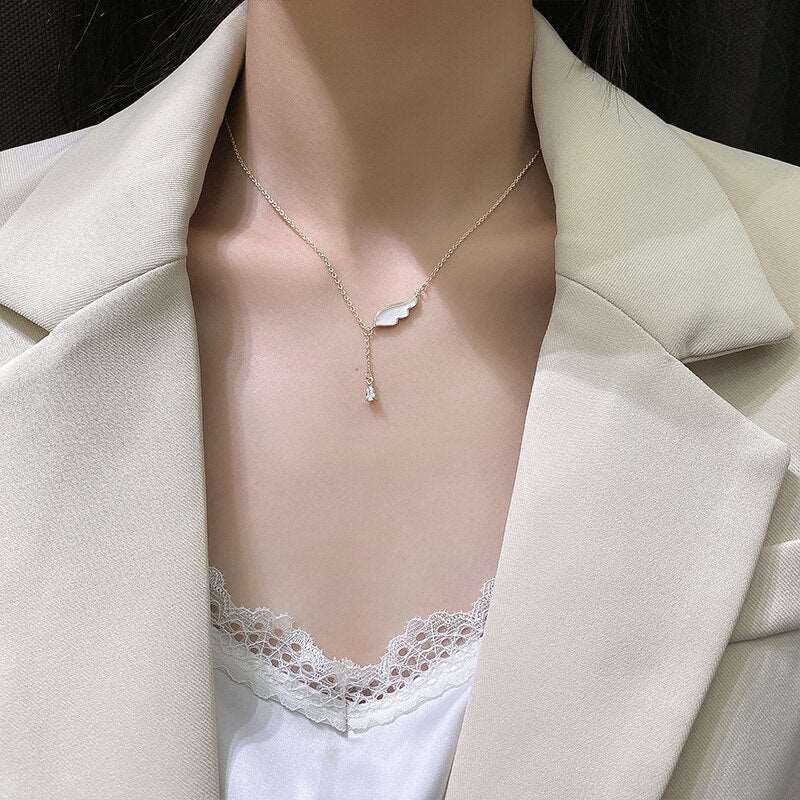 Luxury white wing Crystal Necklace - M&H FashionLuxury white wing Crystal NecklaceM&H FashionM&H Fashion200001034:361181Luxury white wing Crystal NecklaceM&H FashionM&H FashionThis Luxury White Wing Crystal Necklace is a classic piece of jewelry that will add a touch of elegance to any outfit. Crafted from copper alloy and metal, this neckLuxury white wing Crystal Necklace