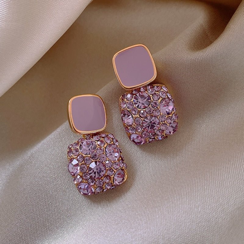 Purple Zircon Square Earrings - M&H FashionPurple Zircon Square EarringsM&H FashionM&H Fashion200001034:361180#Gold;200000783:29#WhiteGoldWhitePurple Zircon Square EarringsM&H FashionM&H FashionThese Purple Zircon Square Earrings from MH.net.co are the perfect accessory for any outfit. With a trendy style and geometric shape, these earrings are sure to makePurple Zircon Square Earrings