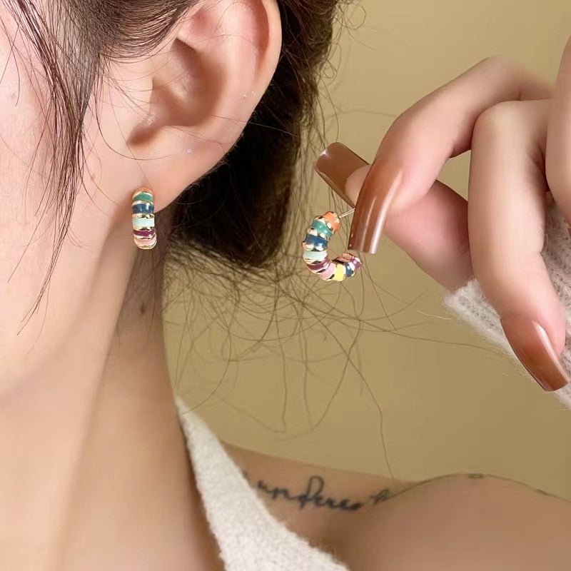 Rainbow Design Mini Simple Stud Earrings - M&H FashionRainbow Design Mini Simple Stud EarringsM&H FashionM&H Fashion200001034:361181#Style BStyle BRainbow Design Mini Simple Stud EarringsM&H FashionM&H FashionThese Rainbow Design Mini Simple Stud Earrings are the perfect accessory for any outfit. With a classic style and geometric shape, these earrings are made from coppeRainbow Design Mini Simple Stud Earrings