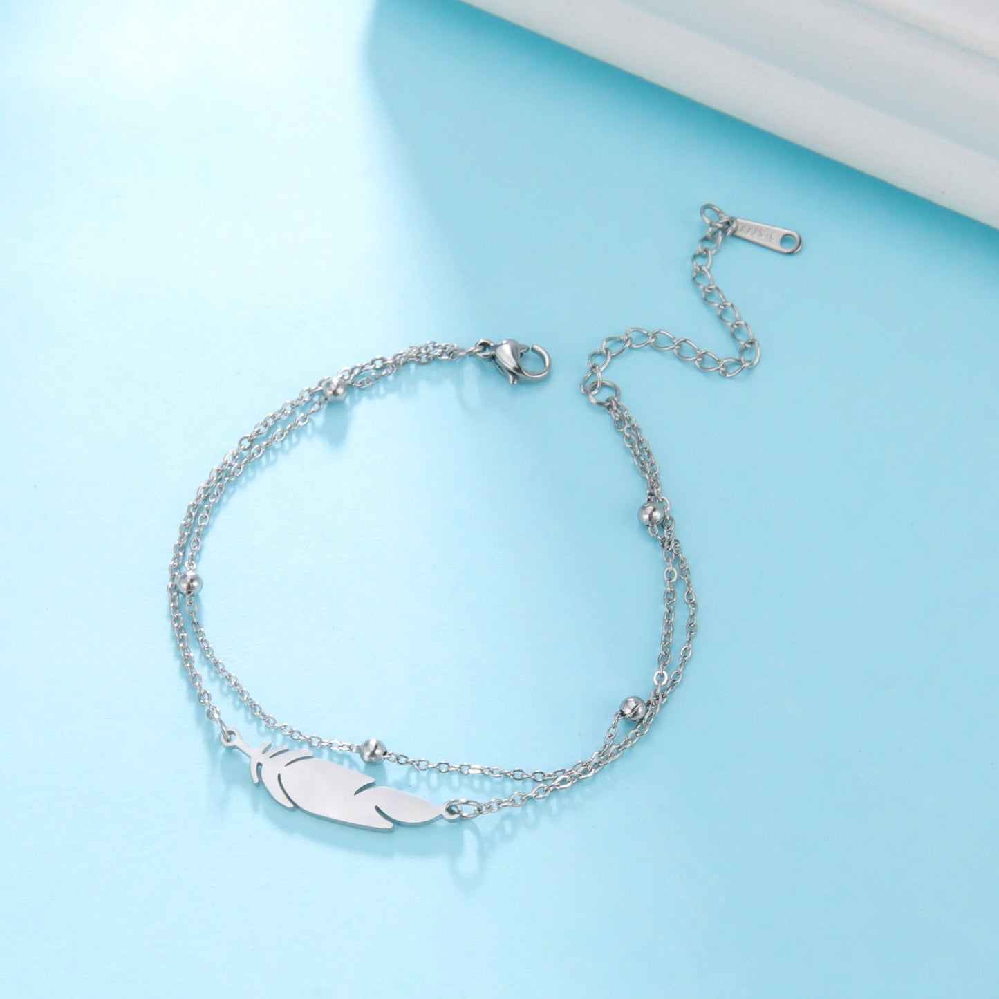 Trendy Anklet - M&H FashionTrendy AnkletM&H FashionM&H Fashion200001034:361180#Silver colorSilver colorTrendy AnkletM&H FashionM&H FashionThis Trendy Anklet is the perfect accessory for any outfit. It features a feather and double chain design, made from stainless steel and metal. The length is 21cm+5cTrendy Anklet